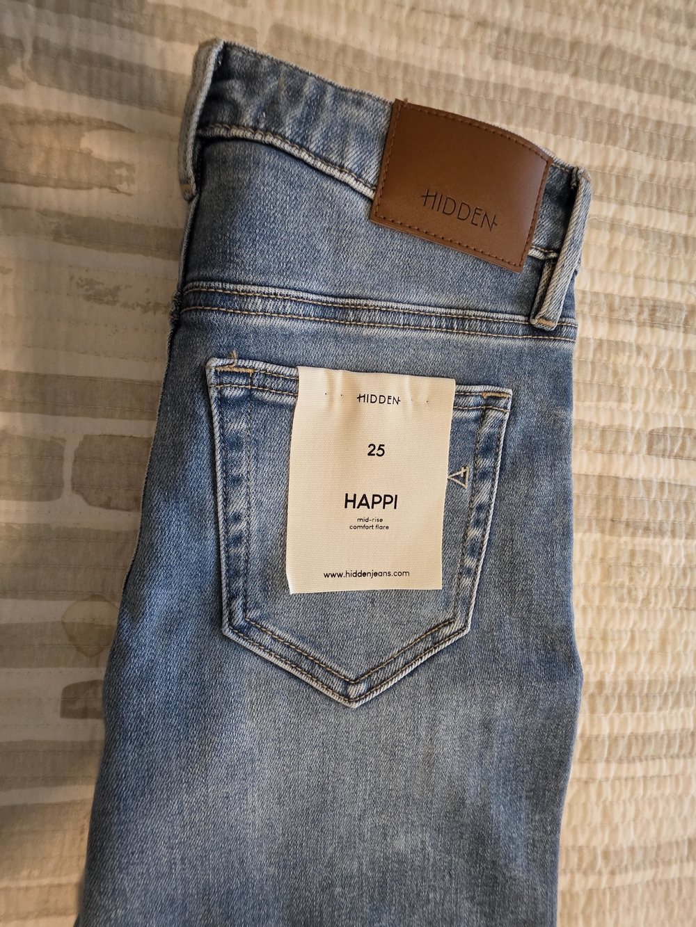 HAPPI Mid-Rise Flare Jeans in Light Blue